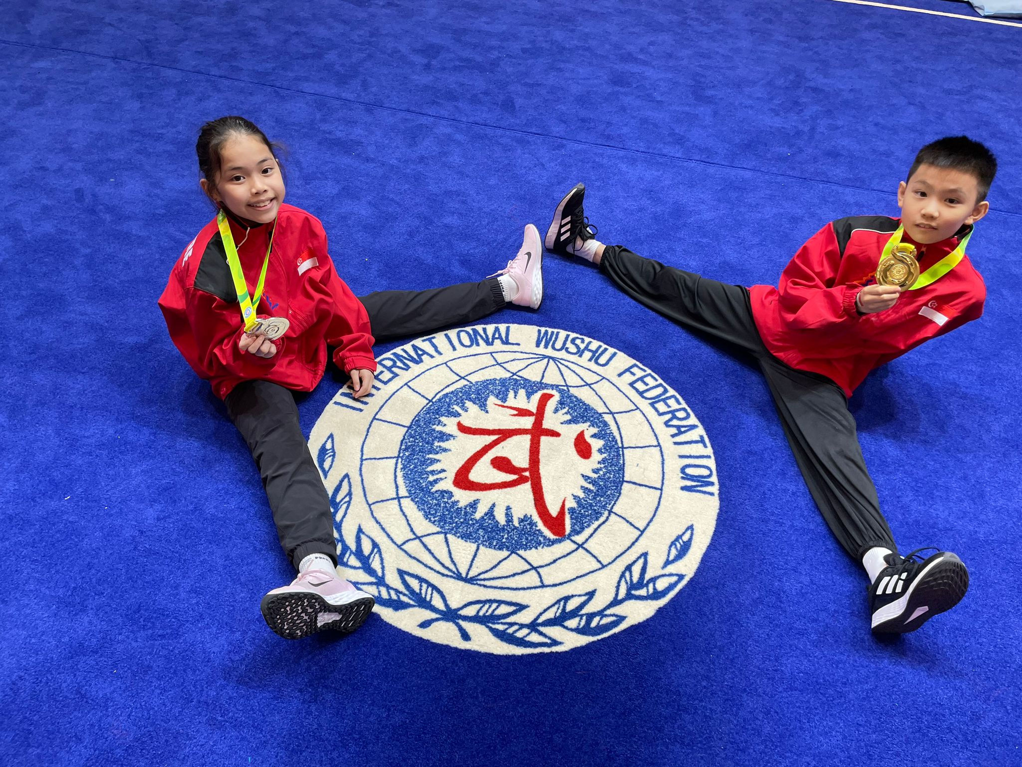Shelby Seah & Ronan Tan, winners at the World Junior Wushu Championships